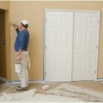 Worker painting interior home project